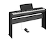 Diagonal side view of the P-145BTB (black model) in combination with the optional stand and metal sustain pedal
