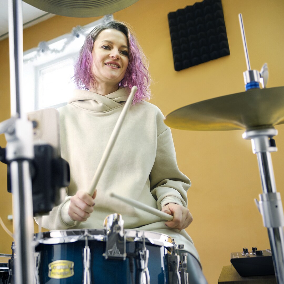 Drummer performing while monitoring an enhanced drum mix created with the Yamaha EAD20.