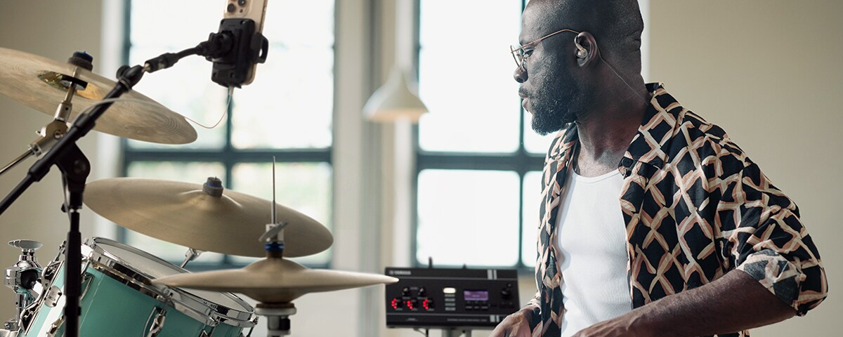 Acoustic drum kit connected to Yamaha EAD20 for practice with backing tracks, click tracks, and monitoring.