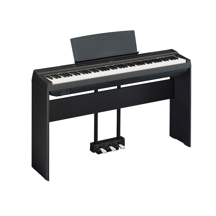 Diagonal side view of the P-125aB (black model) in combination with the optional stand and three-pedal pedal unit