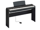 Diagonal side view of the P-125aB (black model) in combination with the optional stand and sustain pedal