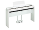 Diagonal side view of the P-125aWH (white model) in combination with the optional stand and three-pedal pedal unit