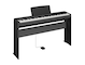 Diagonal side view of the P-145B (black model) in combination with the optional stand and sustain pedal