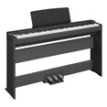 Diagonal side view of the P-223B (black model) in combination with the optional stand and three-pedal pedal unit