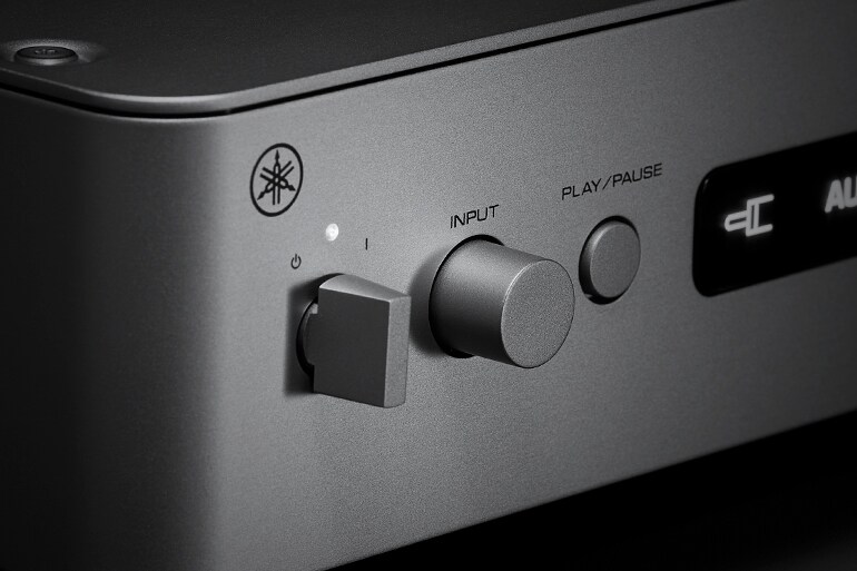 Power knob, input dial, and playback button on the WXC-70A front panel
