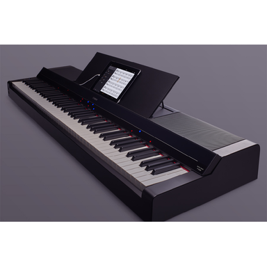 The Yamaha P-S500 and a smart device displaying a music score using the Smart Pianist app